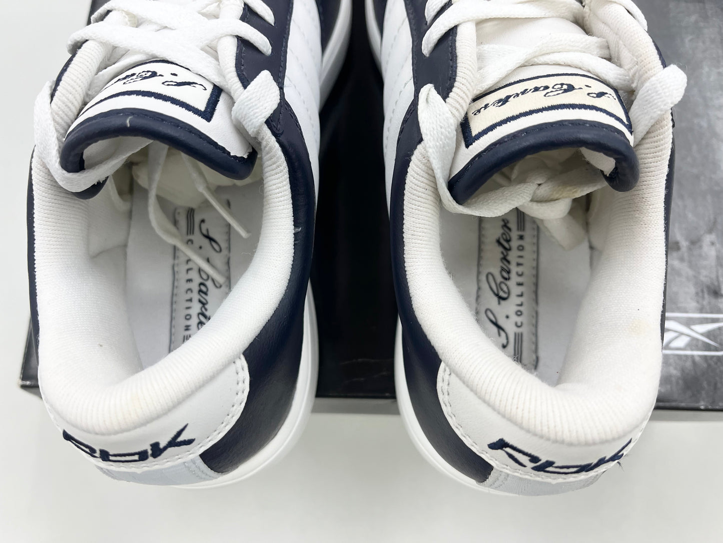 SZ 4.5Y. Kids Reebok S. Carter Bball Low Navy.