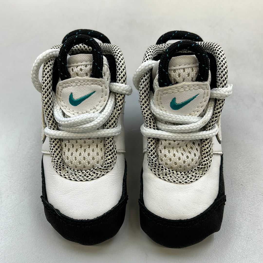 SZ 2C.     1995 Newborn Nike Uptempo teal.